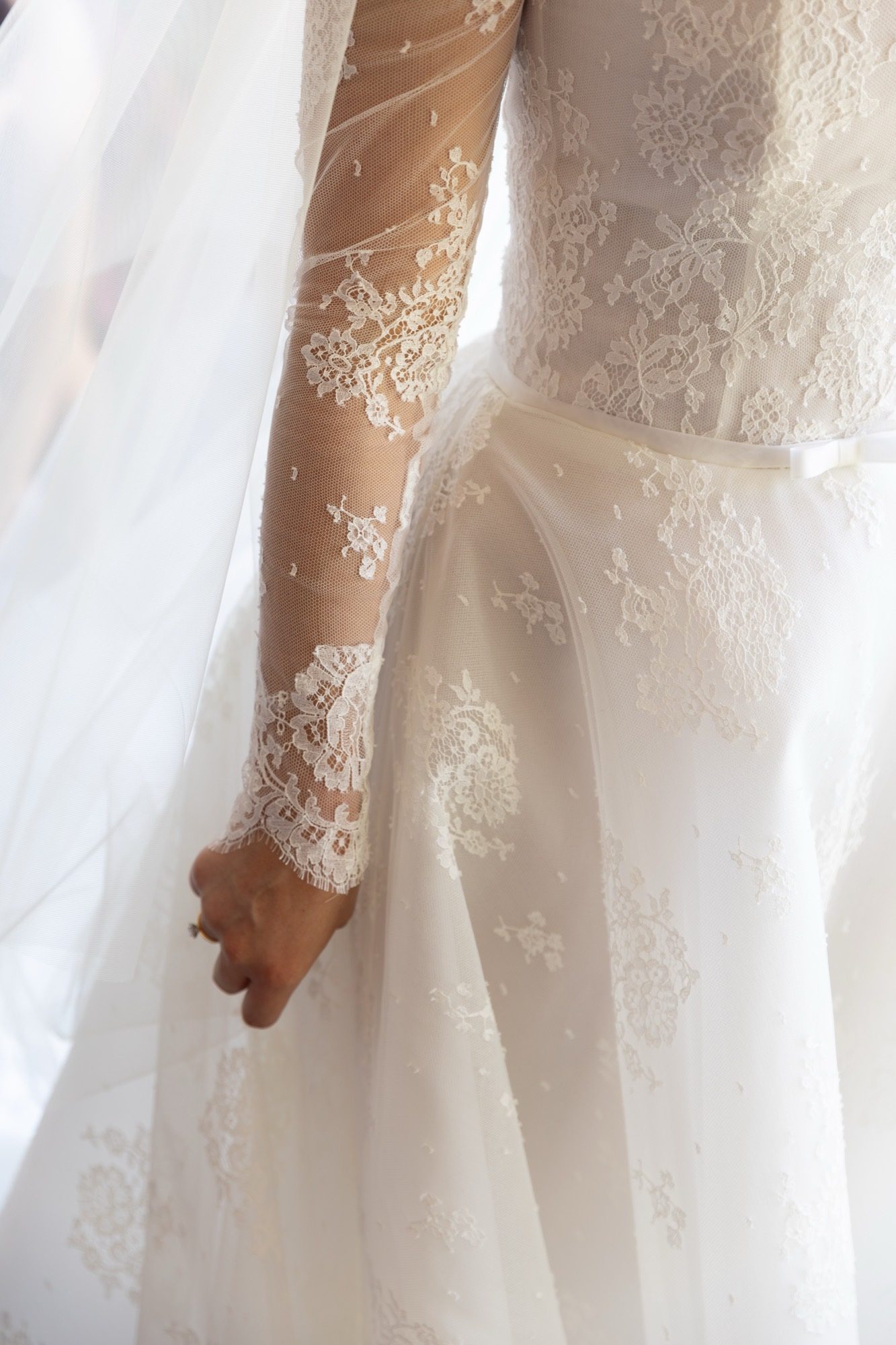 Close detail of the lace sleeve and veil, Freedom Shores, Airlie Beach